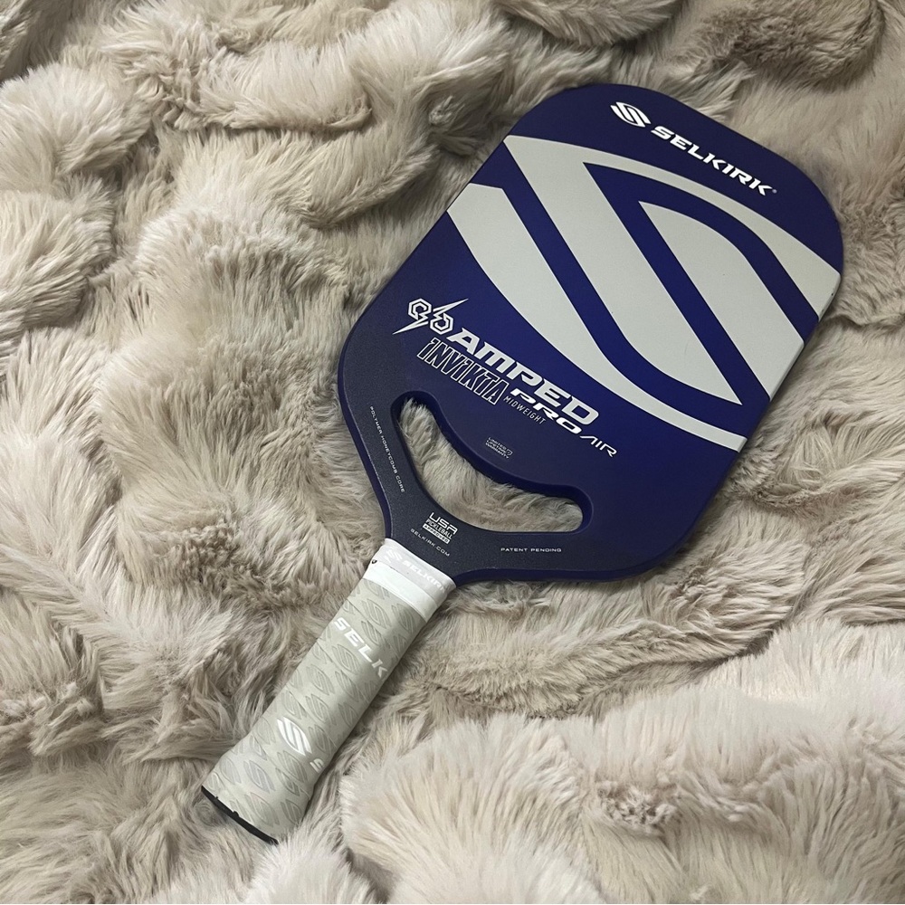 Used Purple pickleball paddle